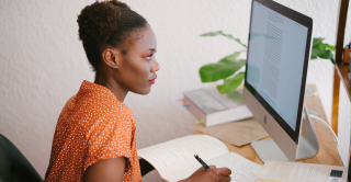 Woman studying on her computer